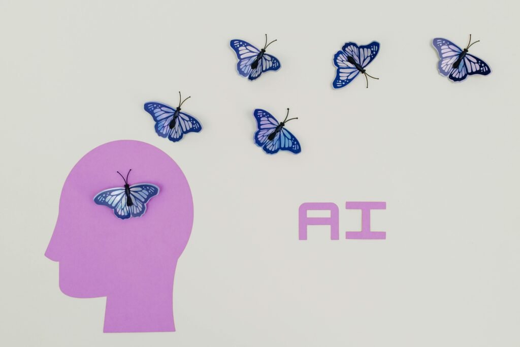 pexels-photo-8849282-8849282 Surreal AI conceptual art featuring butterflies and a human head silhouette in a minimalistic style.